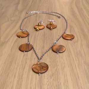 Necklace 24 and 1/2 inches long.Chain is not nickel free .Genuine shell.